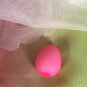 Selling a hot pink egg stress ball. The quality is great and it is squishy!
